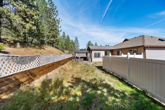 5612 N Vista Grande Dr, Otis Orchards, WA 99027 - fenced backyard with a gazebo