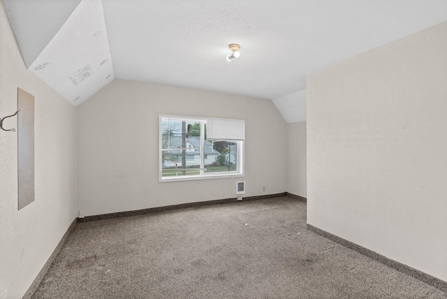 2124 N Dakota St, Spokane, WA 99207 - bonus room featuring lofted ceiling, carpet flooring, and baseboards