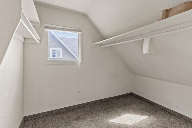 2124 N Dakota St, Spokane, WA 99207 - walk in closet with vaulted ceiling and carpet flooring