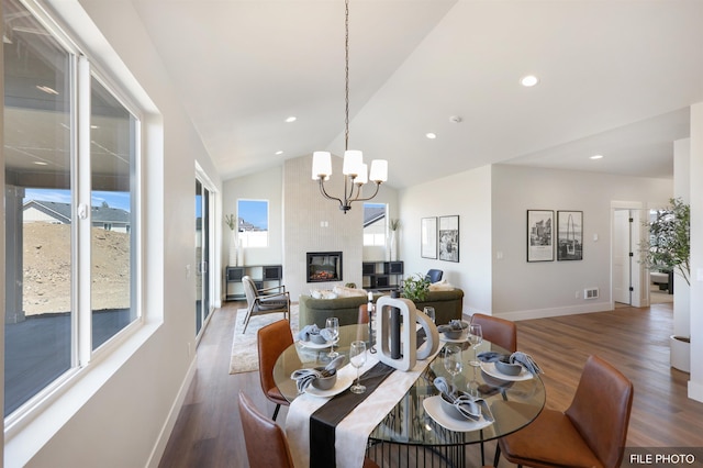 5741 S Sherri Lea Rd, Spokane, WA 99224 - dining space with wood finished floors, baseboards, a chandelier, lofted ceiling, and recessed lighting