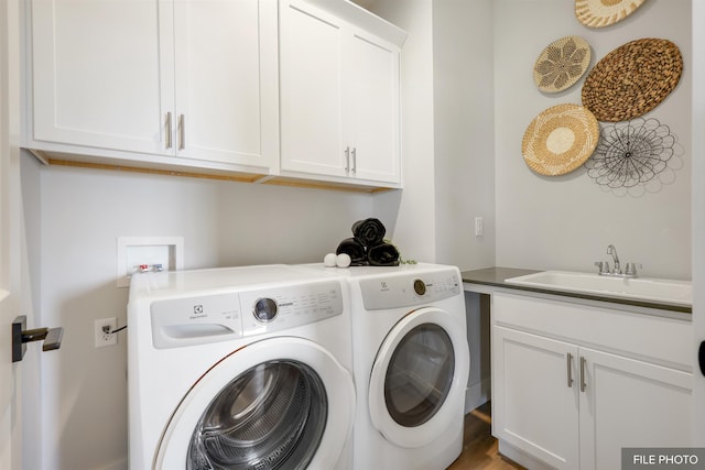 5741 S Sherri Lea Rd, Spokane, WA 99224 - clothes washing area with cabinet space and washing machine and clothes dryer