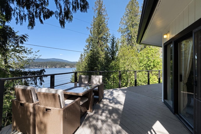 deck featuring a water view