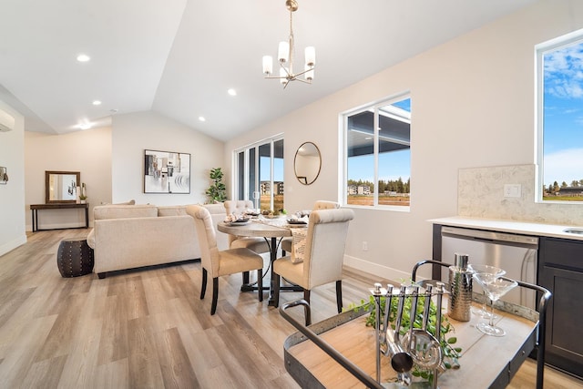 5763 S Sherri Lea Rd, Spokane, WA 99224 - dining space with lofted ceiling, a chandelier, light wood-type flooring, baseboards, and recessed lighting