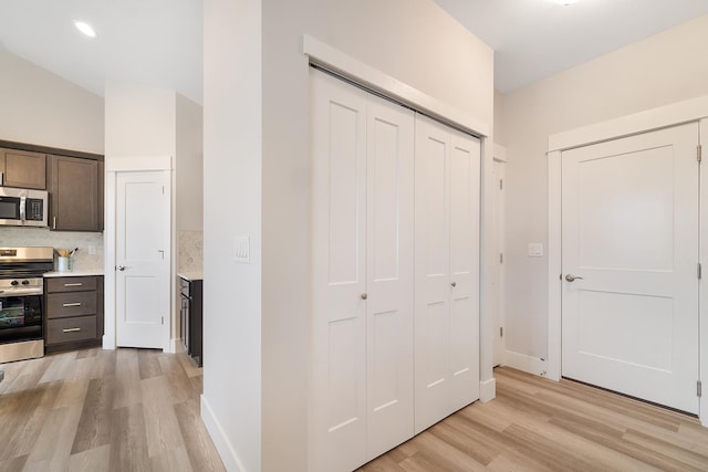 5763 S Sherri Lea Rd, Spokane, WA 99224 - corridor featuring light wood-style floors and baseboards