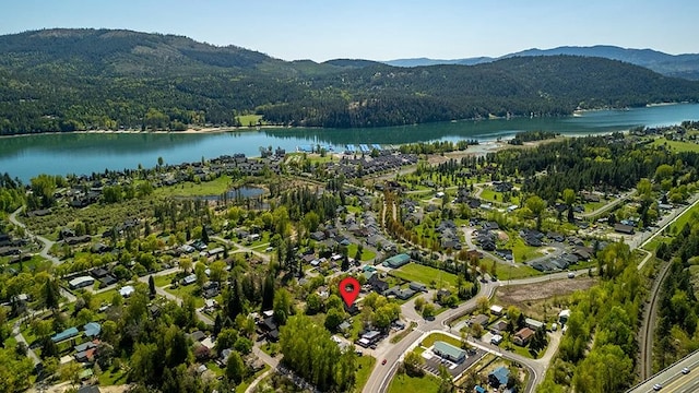 211 4th St, Dover, ID 83825 - aerial view of property's location with a water and mountain view and a heavily wooded area