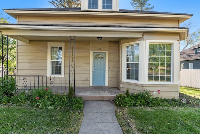 217 S Broadway St, Tekoa, WA 99033 - view of exterior entry with fence and covered porch