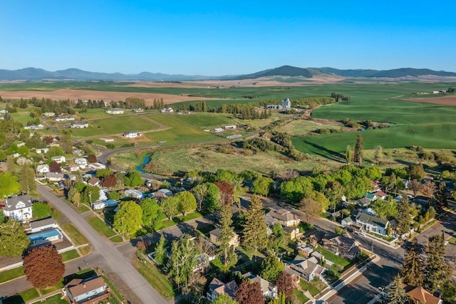 217 S Broadway St, Tekoa, WA 99033 - aerial overview of property's location with a mountainous background