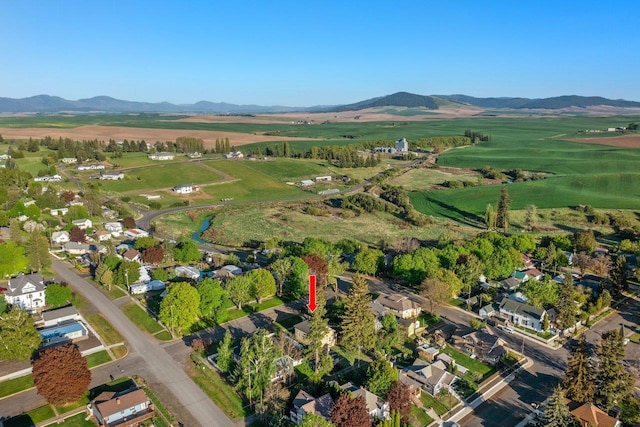217 S Broadway St, Tekoa, WA 99033 - aerial view of property's location featuring a mountain backdrop