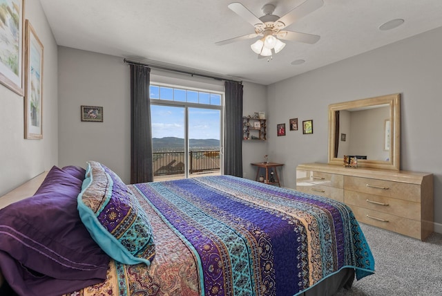 8504 E Black Oak Ln, Spokane, WA 99217 - carpeted bedroom featuring access to exterior and a ceiling fan