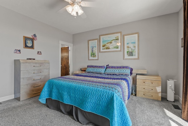 8504 E Black Oak Ln, Spokane, WA 99217 - bedroom with carpet flooring, baseboards, and ceiling fan