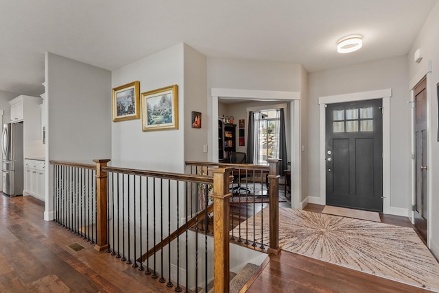 8504 E Black Oak Ln, Spokane, WA 99217 - entryway featuring dark wood-style flooring and baseboards