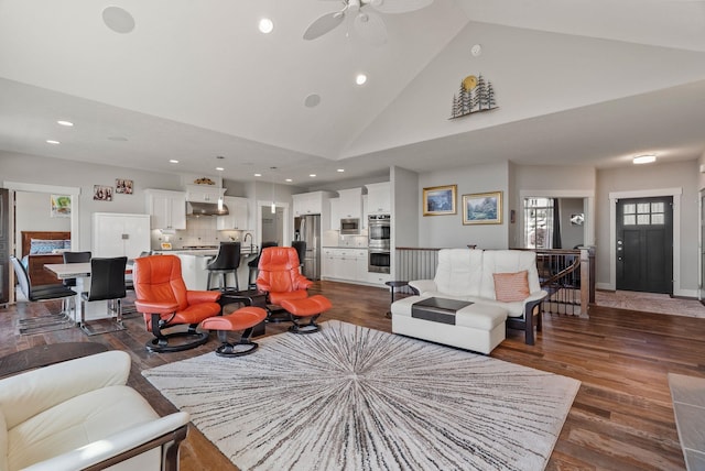 8504 E Black Oak Ln, Spokane, WA 99217 - living area featuring recessed lighting, dark wood-type flooring, high vaulted ceiling, and ceiling fan