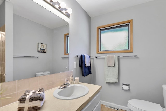 13519 E 26th Ave, Spokane, WA 99216 - bathroom featuring toilet and vanity