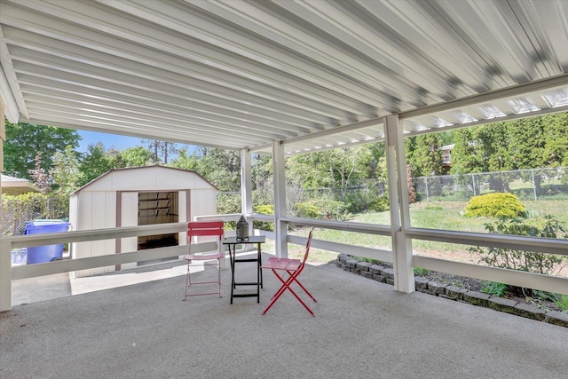 13519 E 26th Ave, Spokane, WA 99216 - view of patio / terrace featuring a storage shed, a fenced backyard, and an outdoor structure