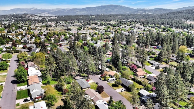 13519 E 26th Ave, Spokane, WA 99216 - aerial view of property's location featuring a mountainous background and nearby suburban area