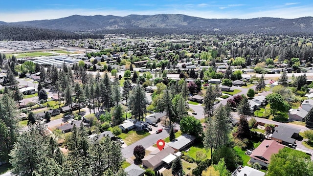13519 E 26th Ave, Spokane, WA 99216 - aerial view of property and surrounding area with a mountain backdrop and nearby suburban area