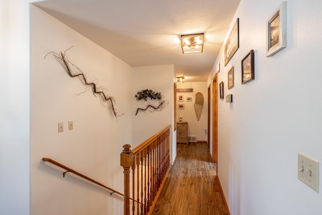 5123 E Lane Park Ct, Mead, WA 99021 - corridor featuring an upstairs landing, wood finished floors, and baseboards
