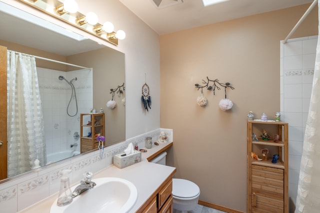 5123 E Lane Park Ct, Mead, WA 99021 - bathroom featuring vanity, toilet, and shower / bath combo with shower curtain