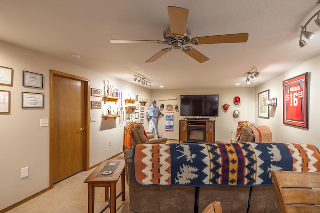 5123 E Lane Park Ct, Mead, WA 99021 - living area with light carpet, ceiling fan, and baseboards