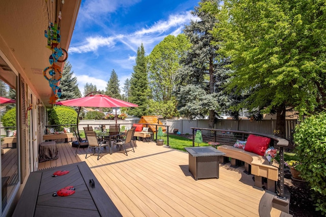 5123 E Lane Park Ct, Mead, WA 99021 - wooden deck with outdoor dining space, a fenced backyard, and an outdoor hangout area