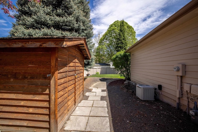 5123 E Lane Park Ct, Mead, WA 99021 - view of side of property featuring fence and central AC