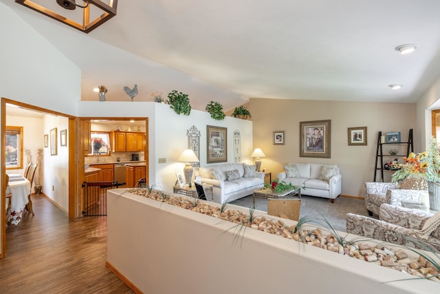 5123 E Lane Park Ct, Mead, WA 99021 - living room with lofted ceiling, wood finished floors, and baseboards
