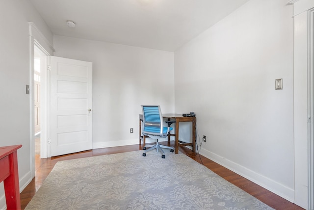 office featuring wood finished floors and baseboards
