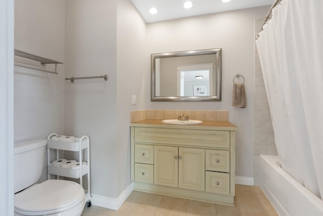 full bathroom with toilet, tile patterned flooring, vanity, shower / tub combo, and baseboards