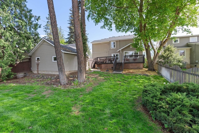 view of yard with a deck