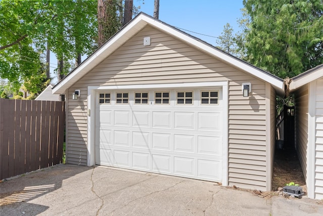 detached garage with fence