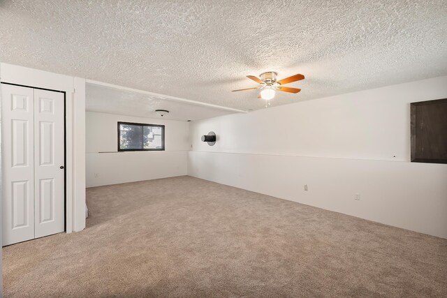 3326 E Pineglen Ave, Mead, WA 99021 - carpeted spare room with ceiling fan and a textured ceiling