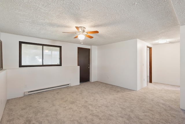 3326 E Pineglen Ave, Mead, WA 99021 - carpeted spare room with baseboard heating, a ceiling fan, and a textured ceiling