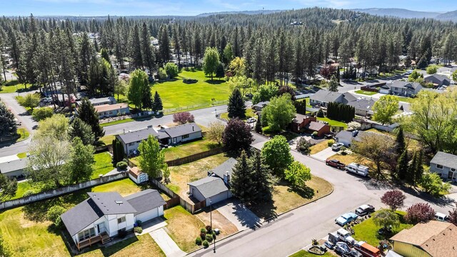 3326 E Pineglen Ave, Mead, WA 99021 - aerial view of residential area with a heavily wooded area