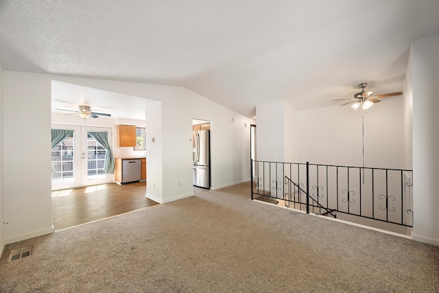 3326 E Pineglen Ave, Mead, WA 99021 - additional living space featuring ceiling fan, carpet flooring, lofted ceiling, baseboards, and french doors