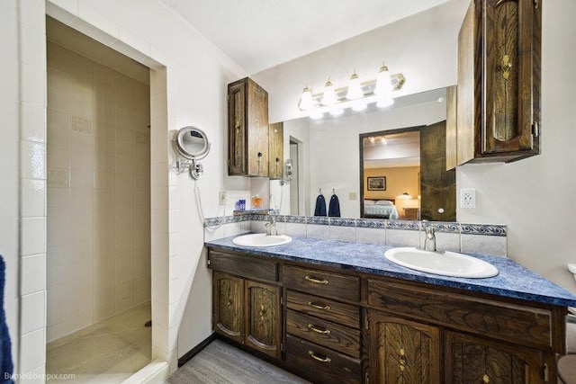 10511 E Cimmaron Dr, Spokane, WA 99206 - ensuite bathroom featuring double vanity and tiled shower