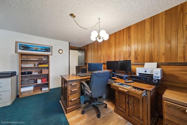 10511 E Cimmaron Dr, Spokane, WA 99206 - office space with wood walls, a chandelier, and a textured ceiling