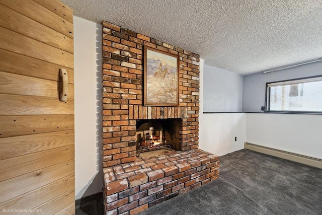 10511 E Cimmaron Dr, Spokane, WA 99206 - unfurnished living room with carpet flooring, a textured ceiling, a baseboard radiator, and a fireplace