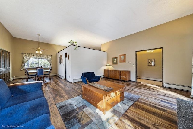 10511 E Cimmaron Dr, Spokane, WA 99206 - living room featuring wood finished floors, a ceiling fan, baseboard heating, and a baseboard radiator