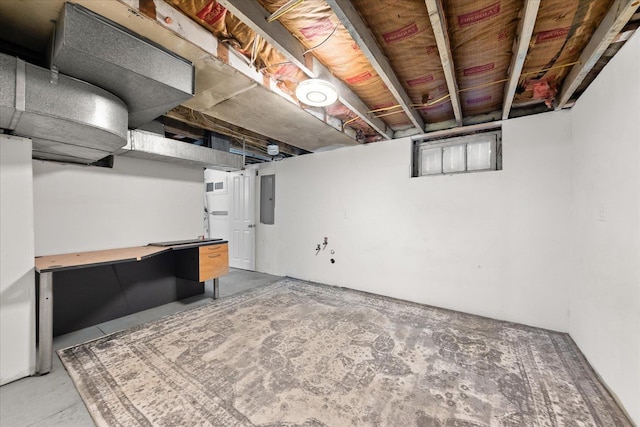 finished basement featuring electric panel