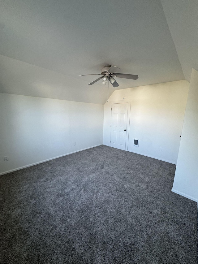 2209 N Washington St, Spokane, WA 99205 - additional living space featuring lofted ceiling, dark carpet, a ceiling fan, and baseboards