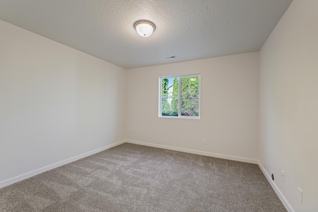 18420 E 1st Ln, Spokane Valley, WA 99016 - unfurnished room with carpet, a textured ceiling, and baseboards