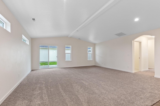 18420 E 1st Ln, Spokane Valley, WA 99016 - carpeted spare room featuring arched walkways, baseboards, and healthy amount of natural light