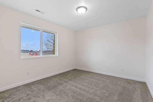 18420 E 1st Ln, Spokane Valley, WA 99016 - empty room featuring carpet flooring and baseboards