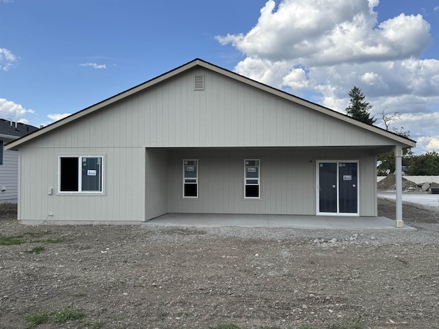 18420 E 1st Ln, Spokane Valley, WA 99016 - rear view of property featuring a porch