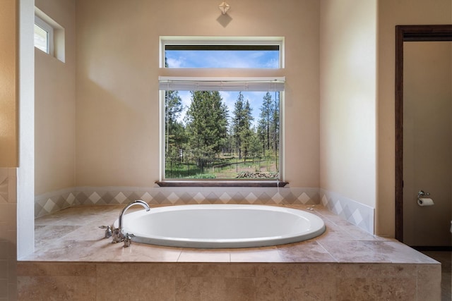 21718 W Watt Rd, Cheney, WA 99004 - bathroom featuring plenty of natural light and a garden tub