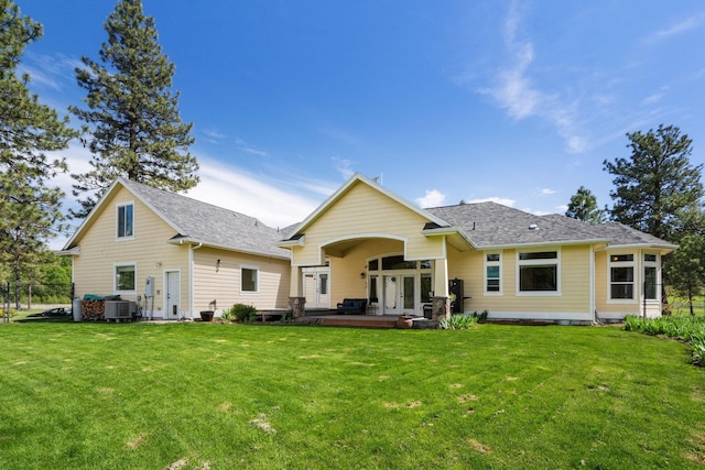21718 W Watt Rd, Cheney, WA 99004 - back of house with french doors, central AC unit, and roof with shingles