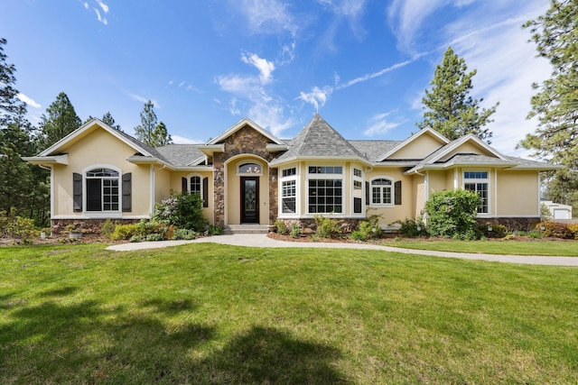 21718 W Watt Rd, Cheney, WA 99004 - ranch-style home featuring stone siding, stucco siding, and a front lawn