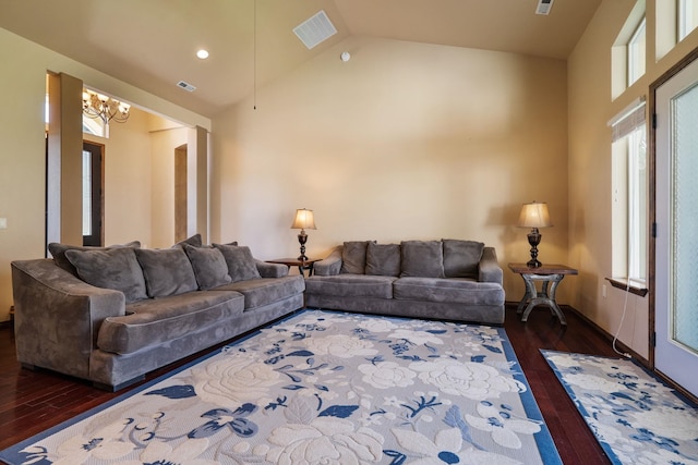 21718 W Watt Rd, Cheney, WA 99004 - living room featuring wood finished floors, high vaulted ceiling, a chandelier, and baseboards