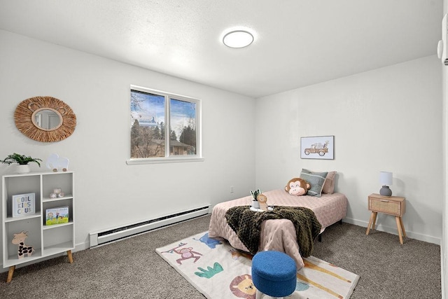 bedroom featuring a baseboard heating unit and carpet
