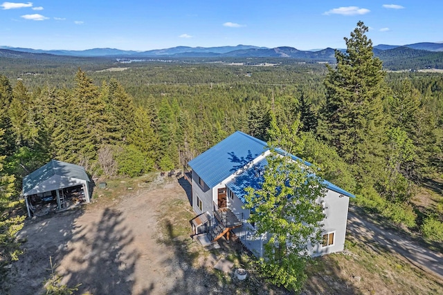 712 Alpen View Ln, Newport, WA 99156 - aerial view of property and surrounding area featuring a heavily wooded area and a mountainous background